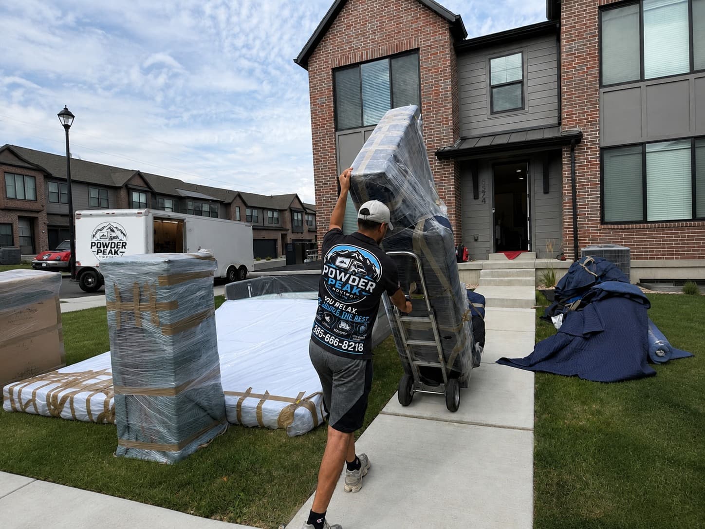 Powder Peak Moving professional moving protected furniture into a Utah home